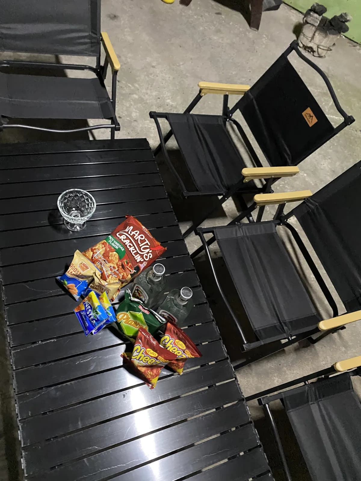 Chairs and table set up at night