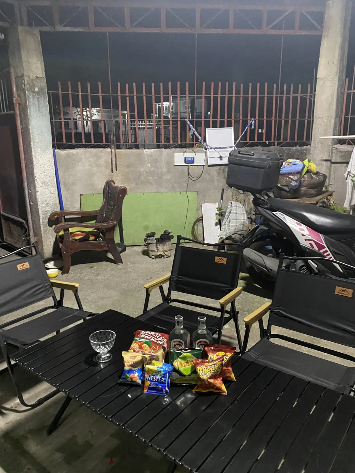 Chairs and table set up at night